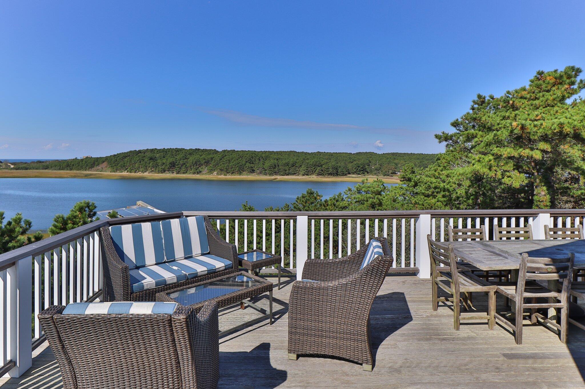 1035 Chequessett Neck Road Wellfleet, MA 02667 - Photo 59 of 86 a view of a chair and table on the roof deck