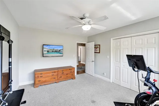 a view of a livingroom with furniture and a flat screen tv