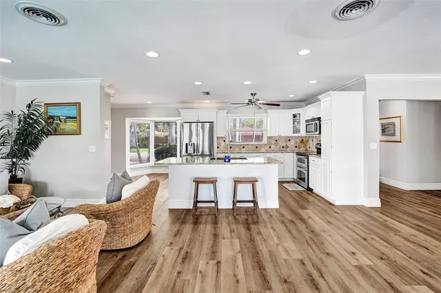 a living room with furniture and a table