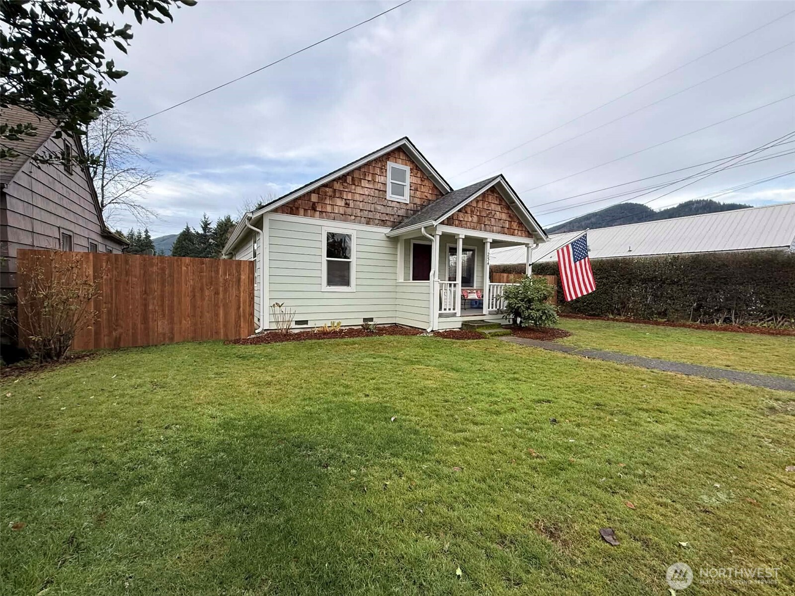 254 5th Street Morton, WA 98356 - Photo 1 of 23 a front view of house with yard and green space