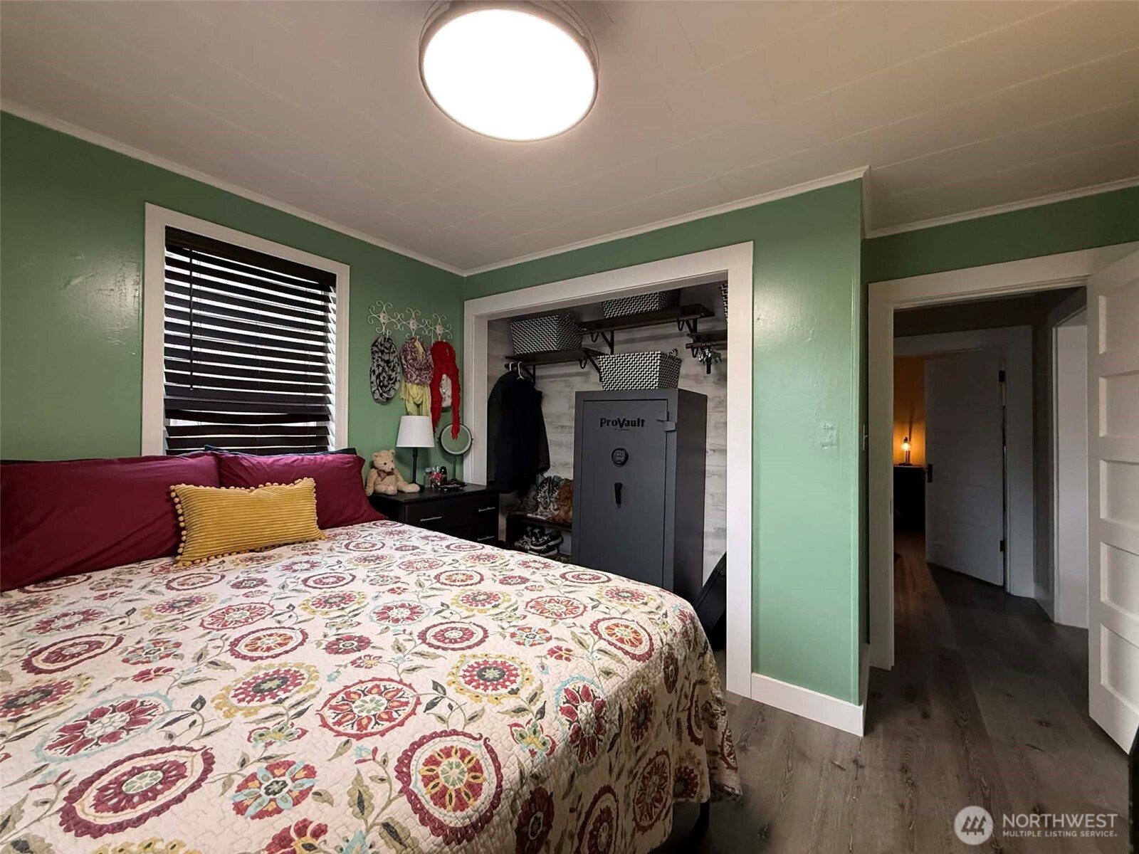 254 5th Street Morton, WA 98356 - Photo 13 of 23 a bedroom with a large bed and a dresser