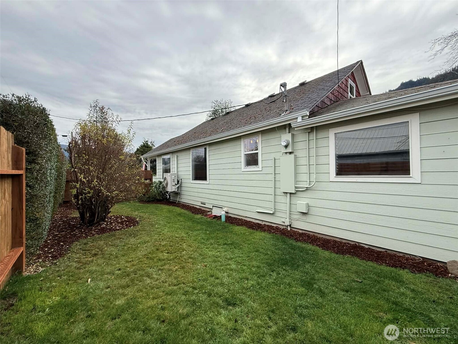 254 5th Street Morton, WA 98356 - Photo 3 of 23 a view of a house with a yard