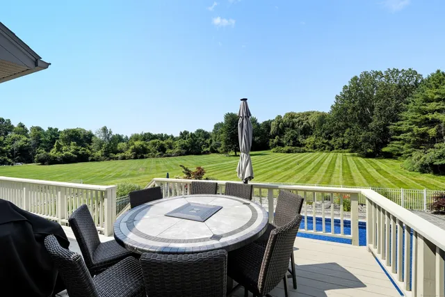 a view of a chairs and table on the terrace