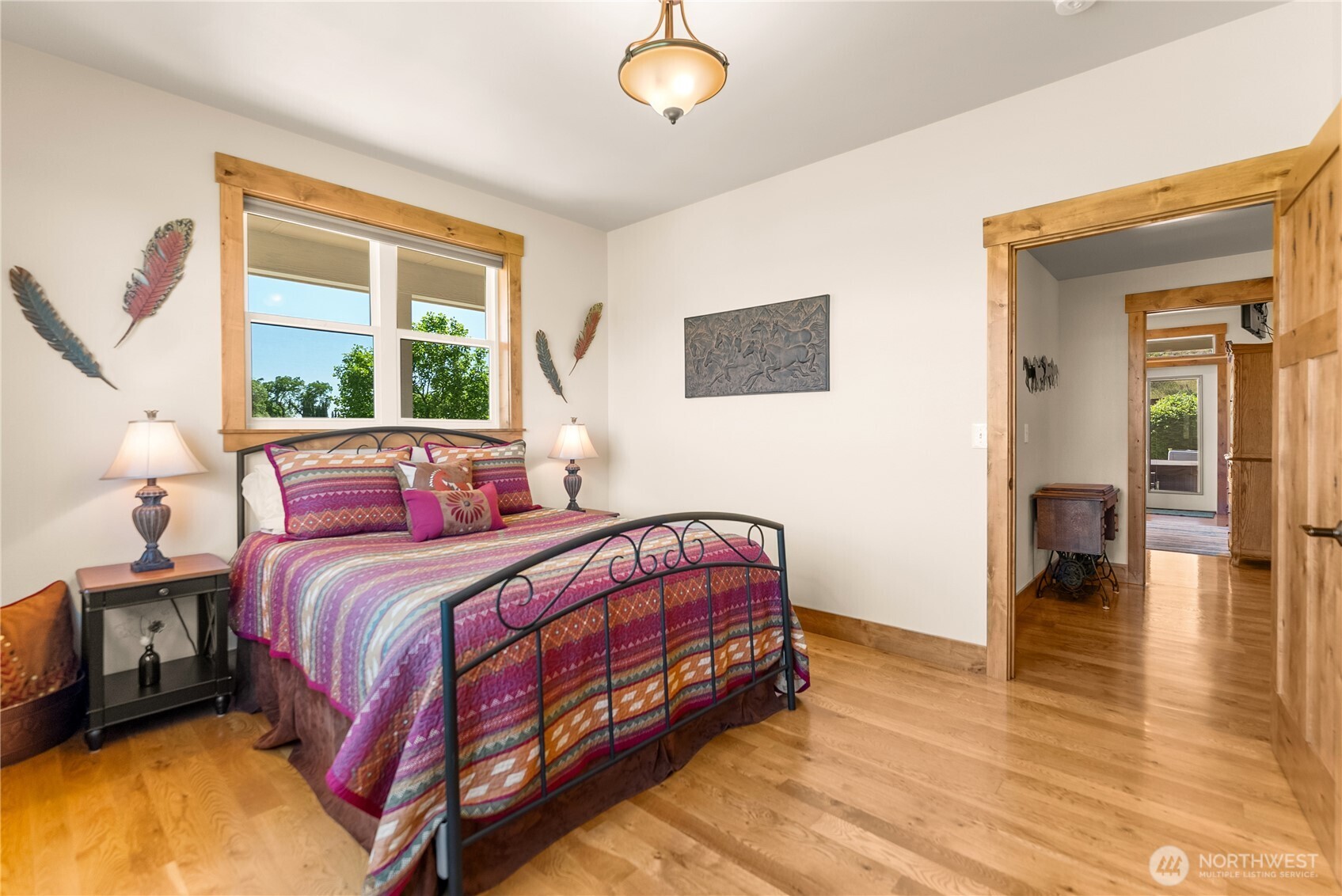 23 George Road Omak, WA 98841 - Photo 21 of 40 a bedroom with a bed and wooden floor
