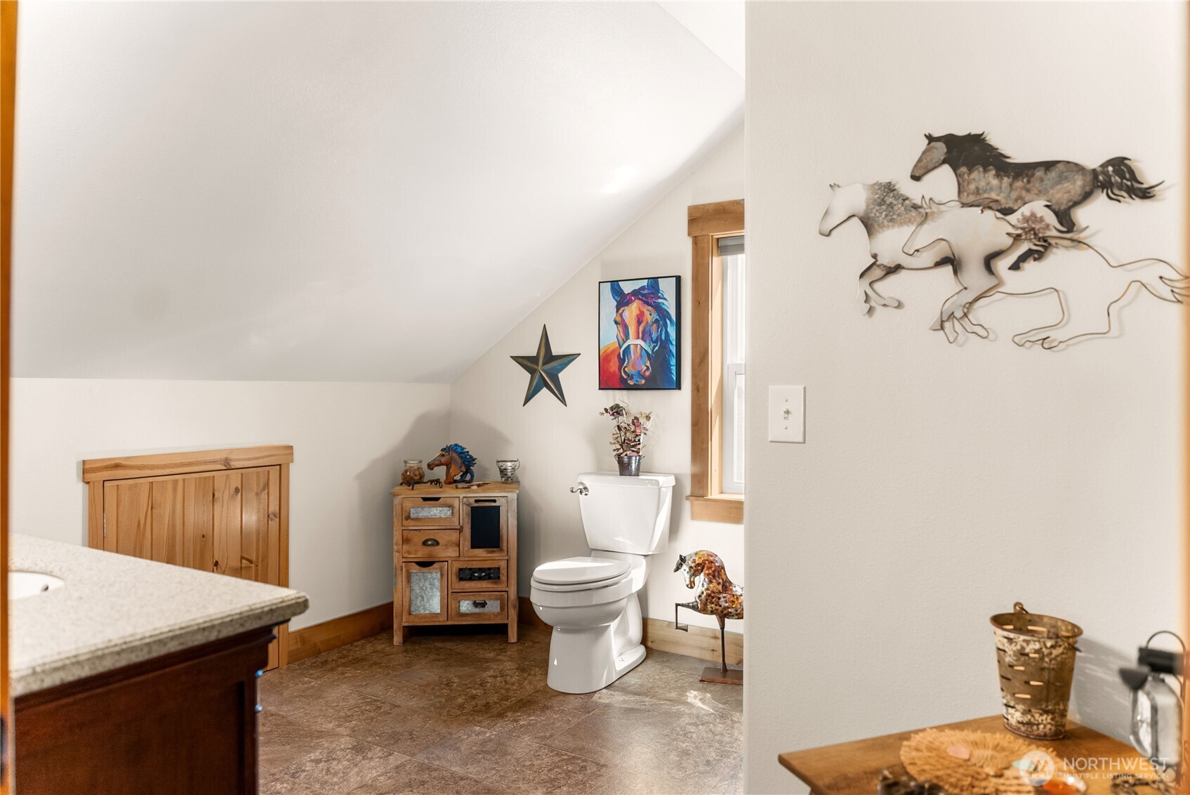 23 George Road Omak, WA 98841 - Photo 27 of 40 a living room with furniture and a toilet