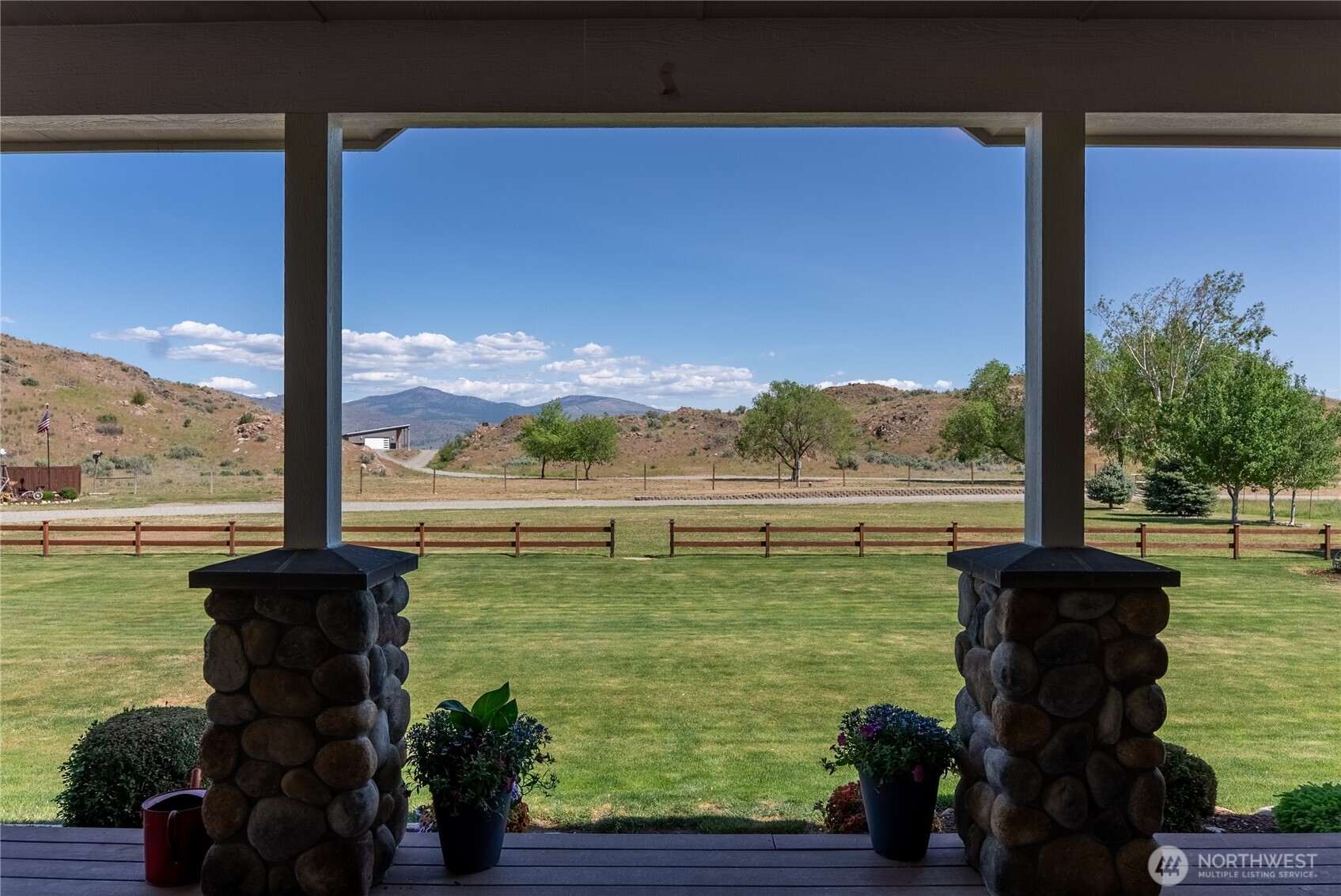 23 George Road Omak, WA 98841 - Photo 30 of 40 a view of a lake from a balcony