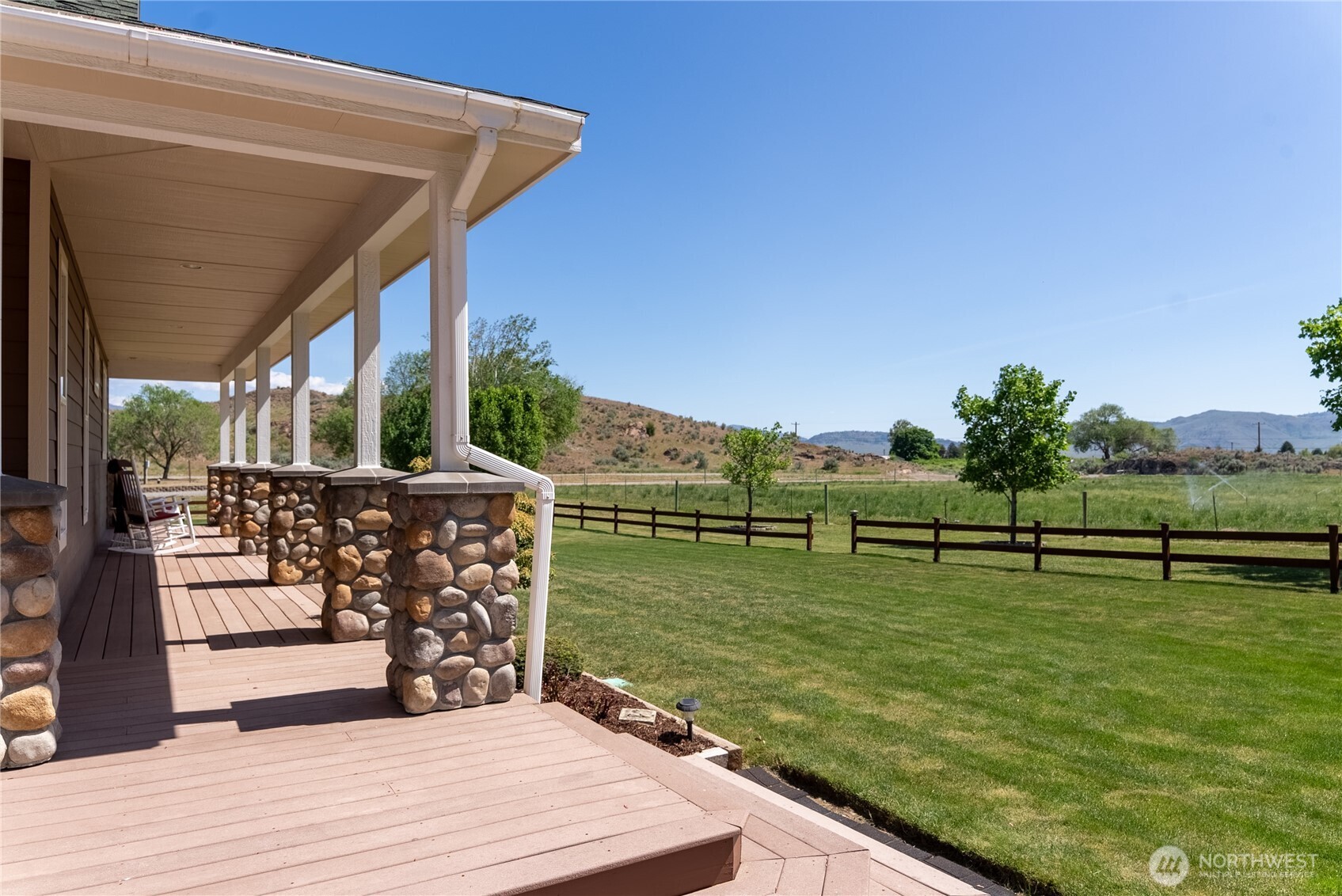 23 George Road Omak, WA 98841 - Photo 31 of 40 a view of a lake with a big yard