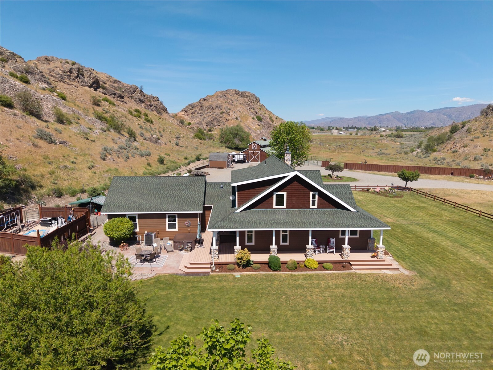 23 George Road Omak, WA 98841 - Photo 34 of 40 a front view of a house with a garden