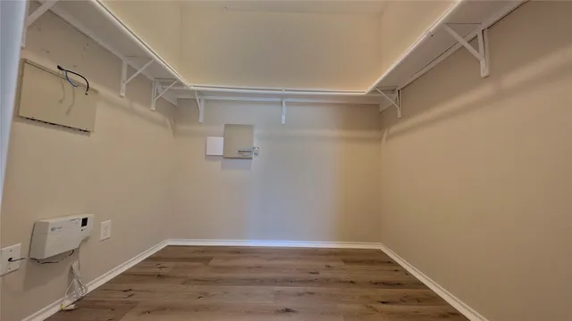 a view of an empty walk in closet
