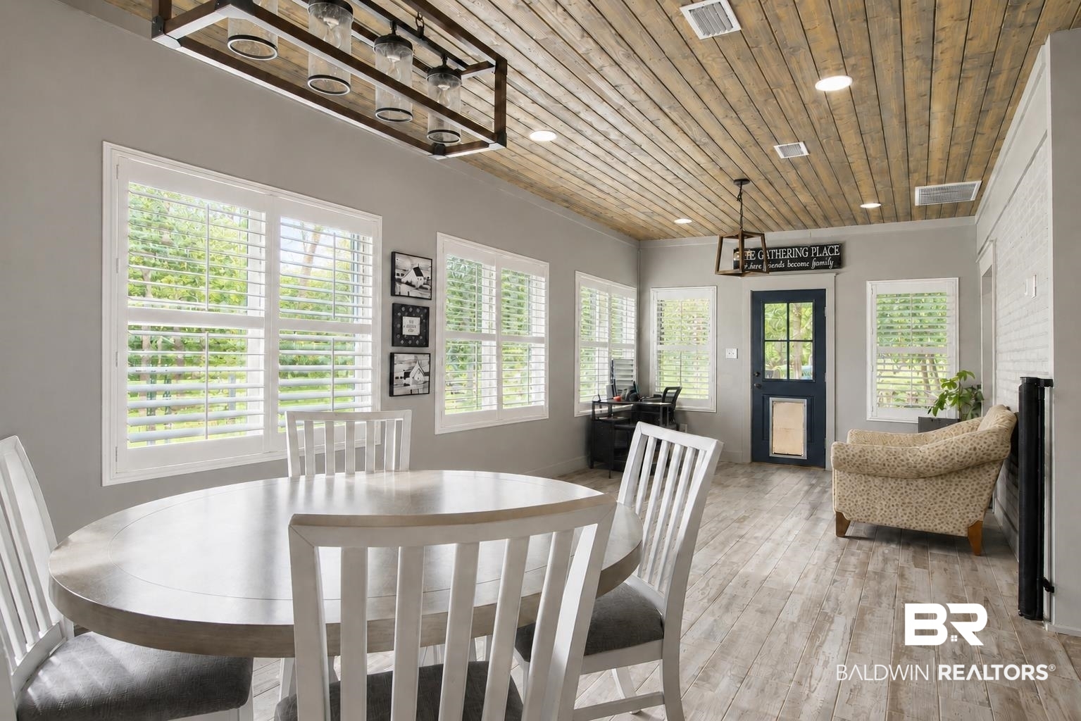 9825 Wolf Creek Ridge Elberta, AL 36530 - Photo 28 of 76 Wood-finish plank ceiling and flooring complement the light gray wall tones