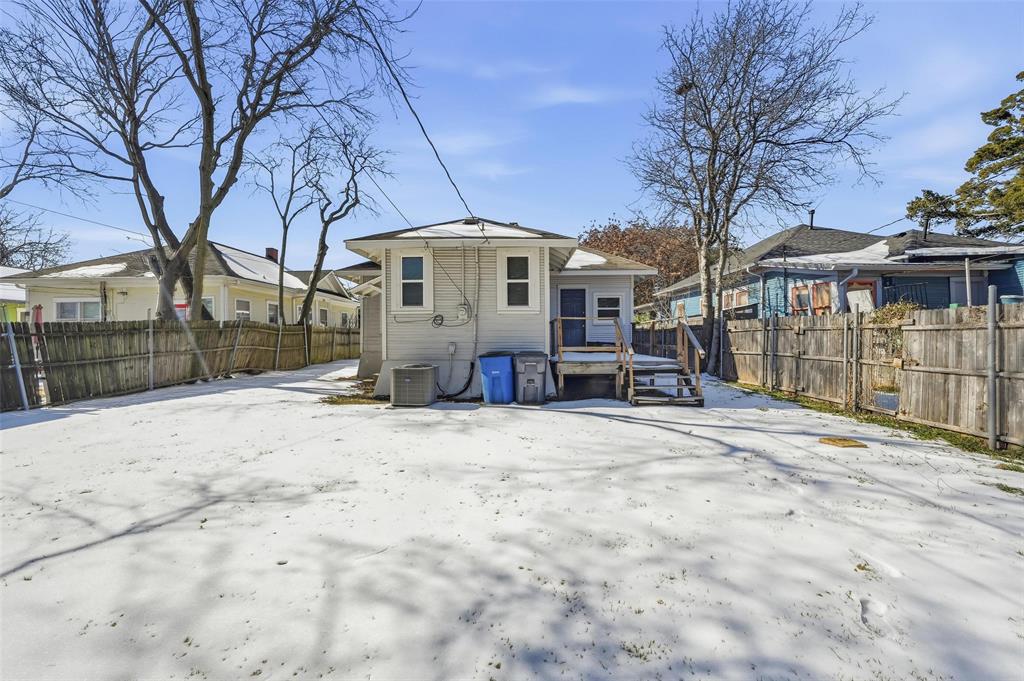 526 South Clinton Avenue Dallas, TX 75208 - Photo 5 of 25 a view of a house with a snow in the yard