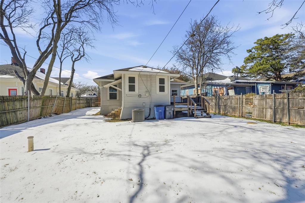 526 South Clinton Avenue Dallas, TX 75208 - Photo 6 of 25 a front view of a house with a yard