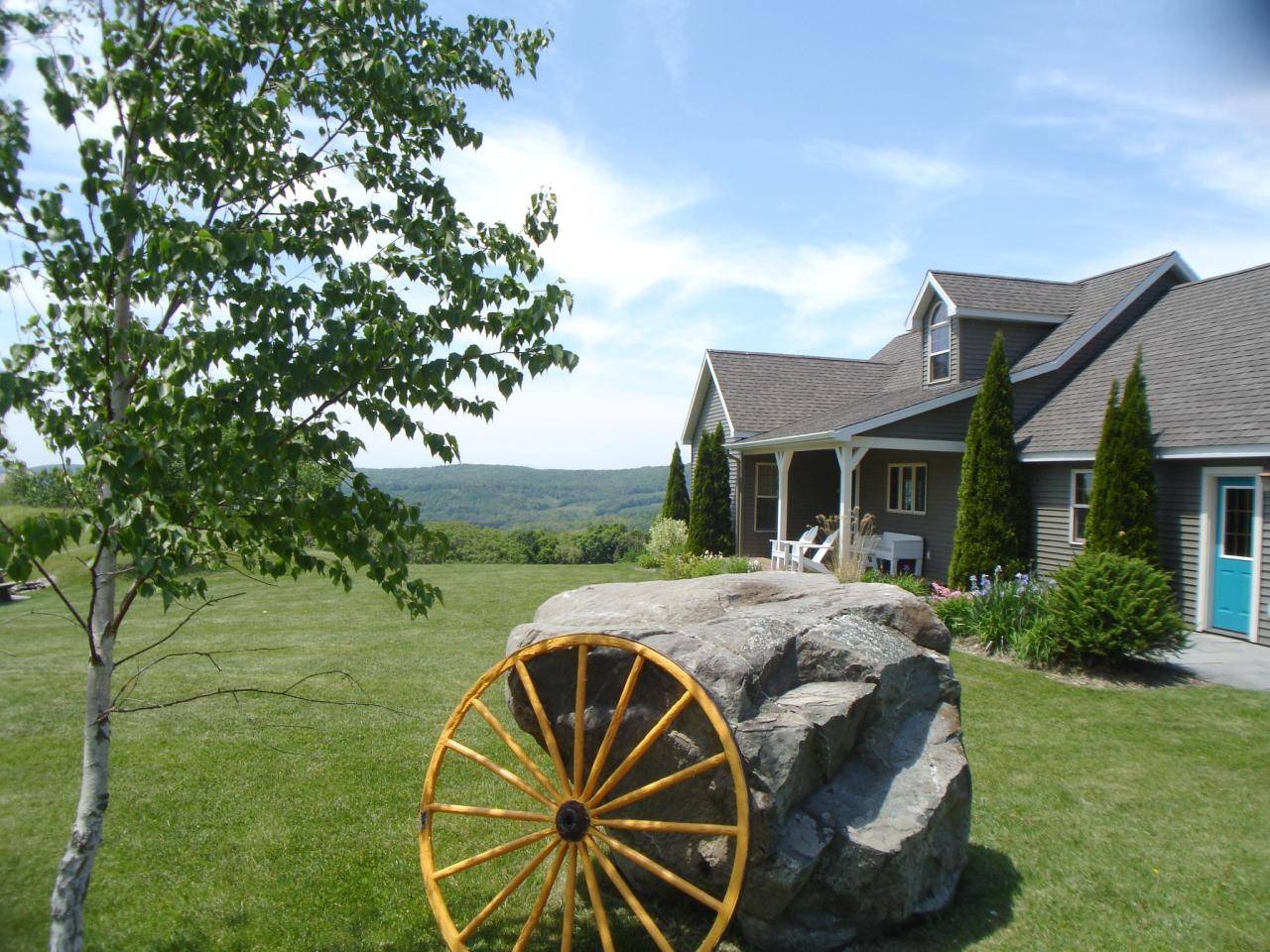 331 North Mountain Road Copake, NY 12517 - Photo 2 of 11 a view of a house with backyard porch and garden