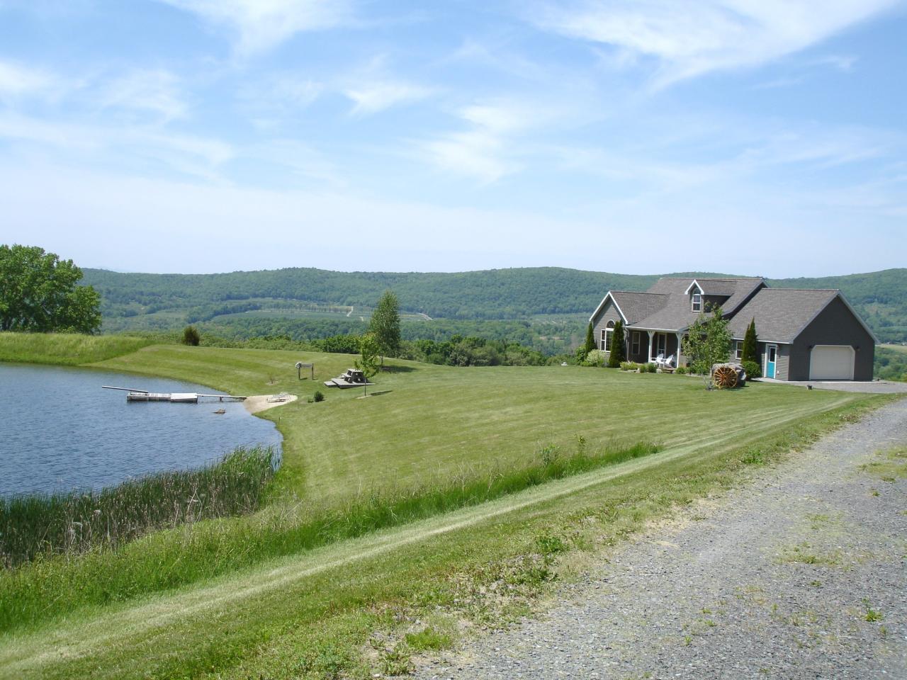 331 North Mountain Road Copake, NY 12517 - Photo 11 of 11 a view of an houses with outdoor space and garden