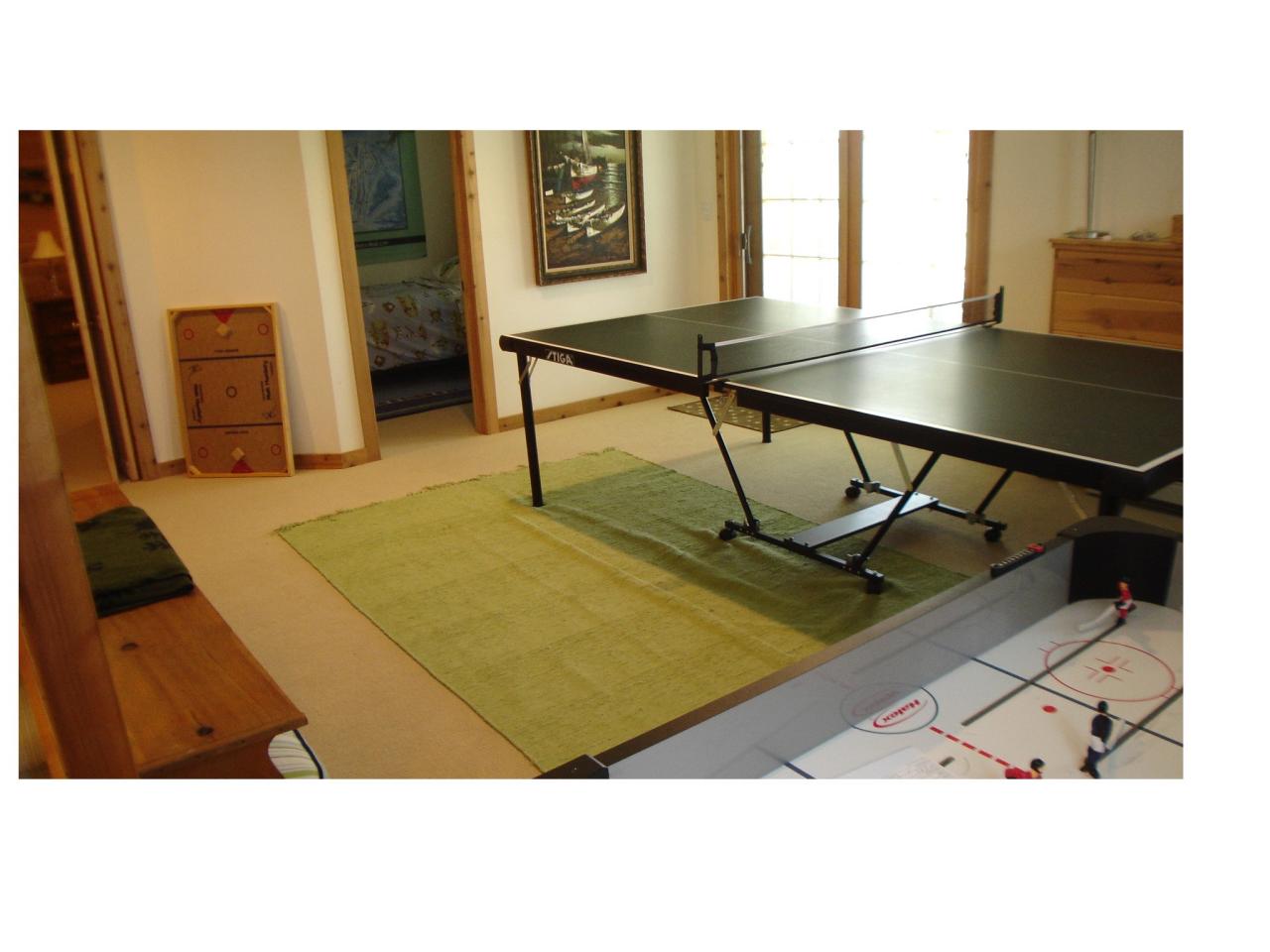 331 North Mountain Road Copake, NY 12517 - Photo 7 of 11 a picture of a living room with a table and paintings on the wall