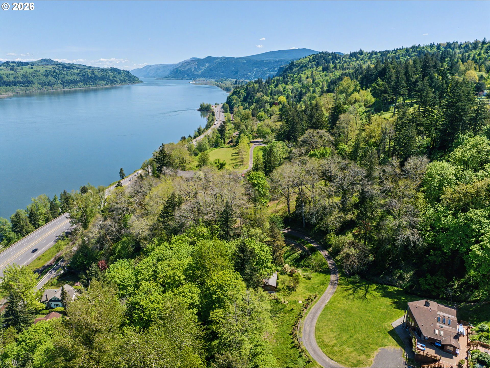 2445 Northeast Corbett Hill Road Corbett, OR 97019 - Photo 12 of 31 an aerial view of a residential houses with outdoor space and trees all around