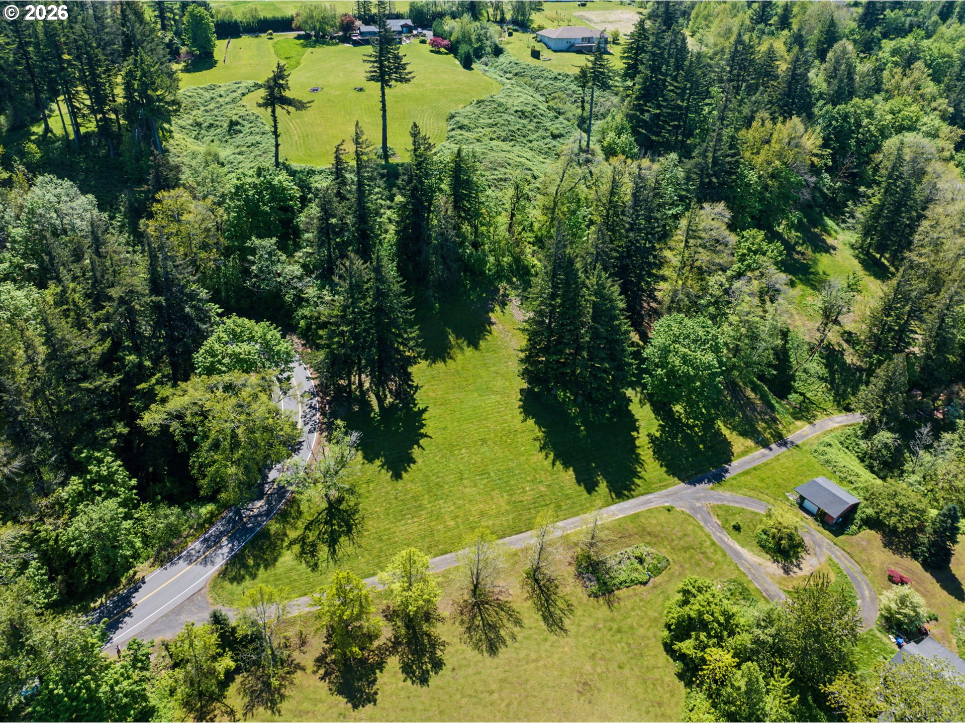 2445 Northeast Corbett Hill Road Corbett, OR 97019 - Photo 13 of 31 a view of a lake with large trees