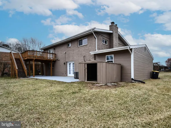 a front view of house with yard