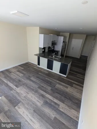 a view of kitchen and microwave