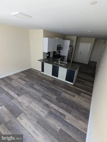 a view of kitchen and microwave