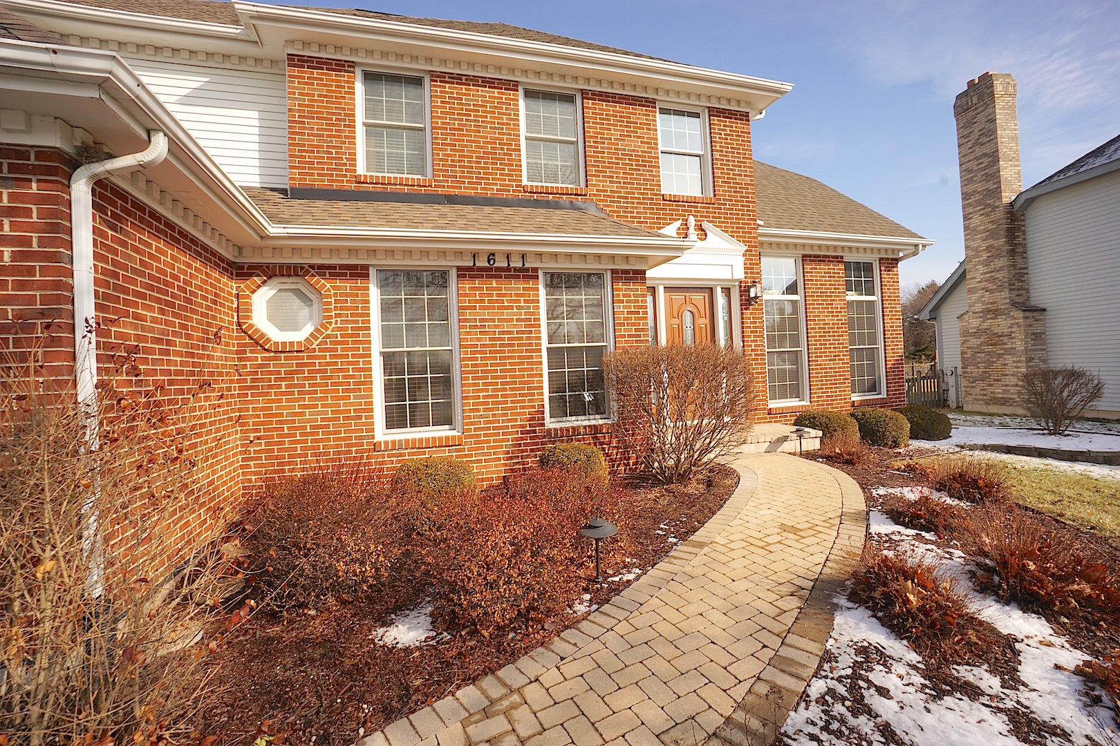 1611 Canyon Run Road Naperville, IL 60565 - Photo 2 of 23 a front view of a house