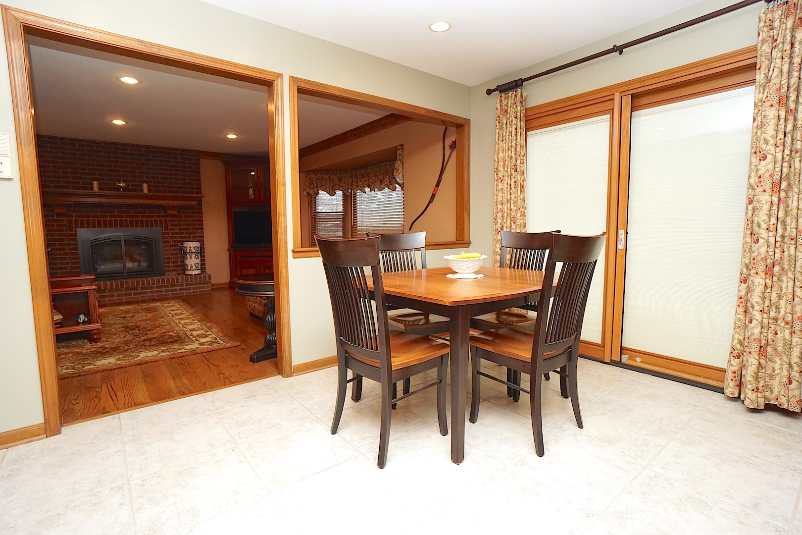 1611 Canyon Run Road Naperville, IL 60565 - Photo 12 of 23 a dining room with furniture and window