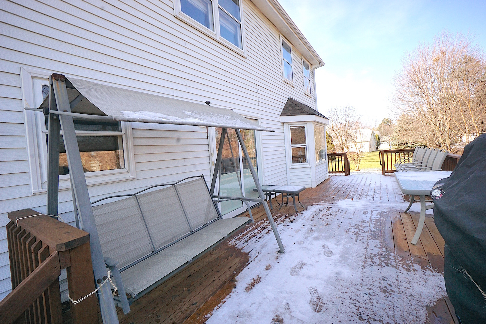 1611 Canyon Run Road Naperville, IL 60565 - Photo 23 of 23 a view of a patio with a table and chairs