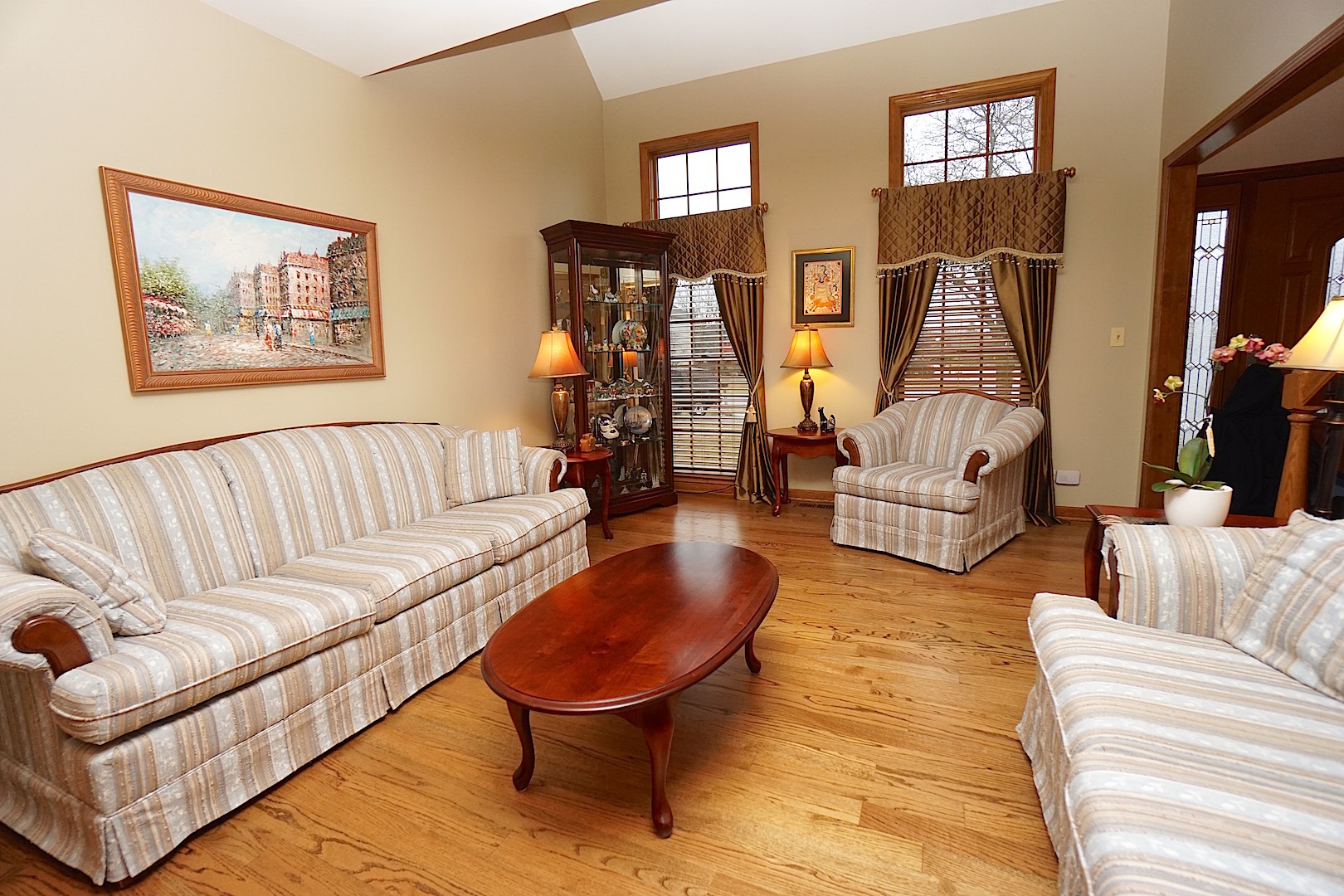 1611 Canyon Run Road Naperville, IL 60565 - Photo 5 of 23 a living room with furniture and wooden floor