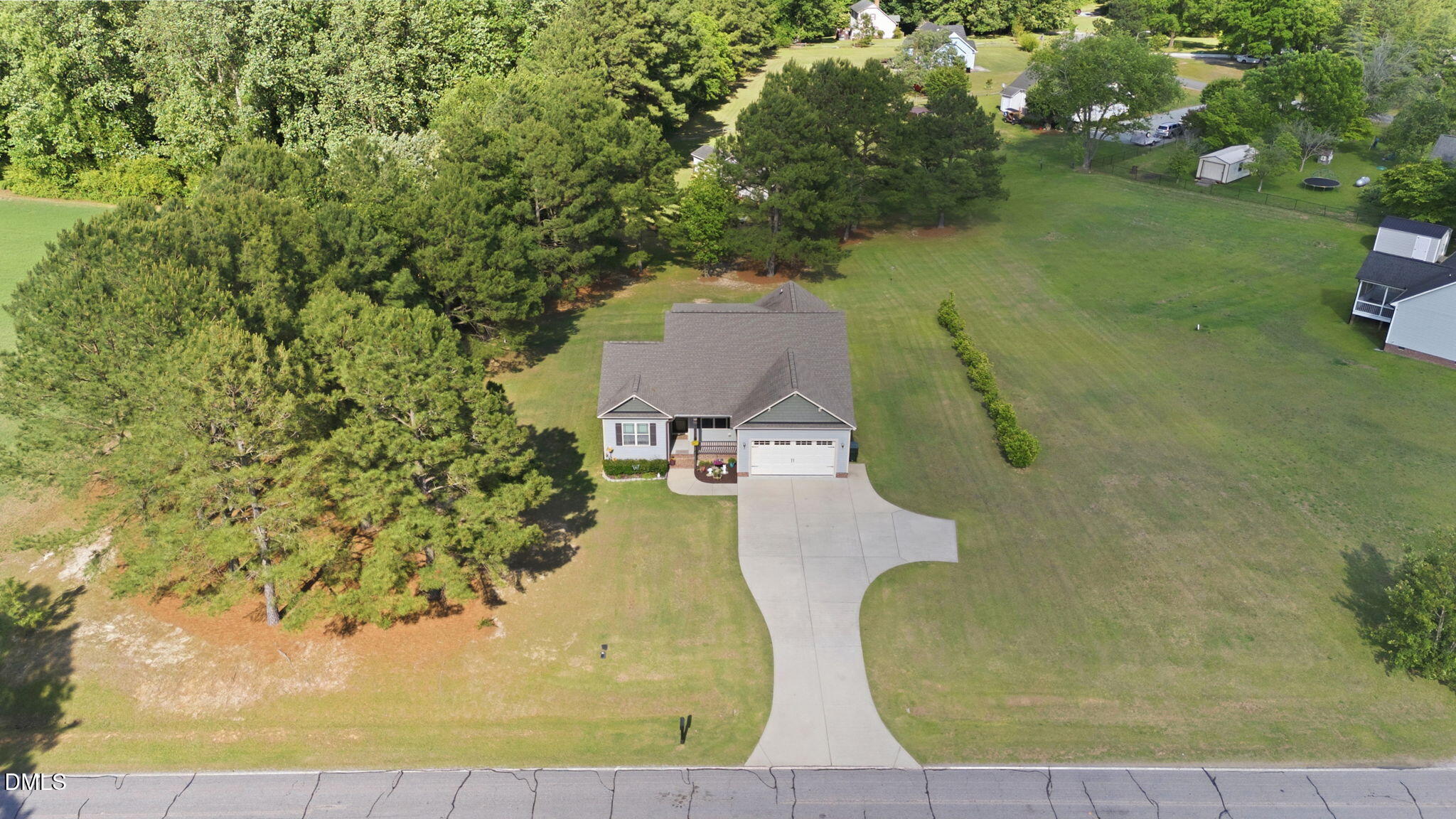 1547 Lassiter Pond Road Four Oaks, NC 27524 - Photo 35 of 45 an aerial view of a house with a yard basket ball court and outdoor seating