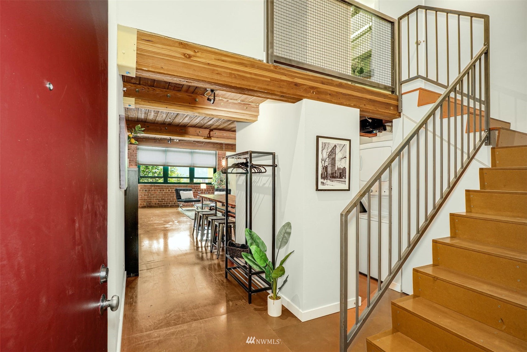 66 Bell Street, Unit 203 Seattle, WA 98121 - Photo 5 of 35 a view of entryway and hall with wooden floor