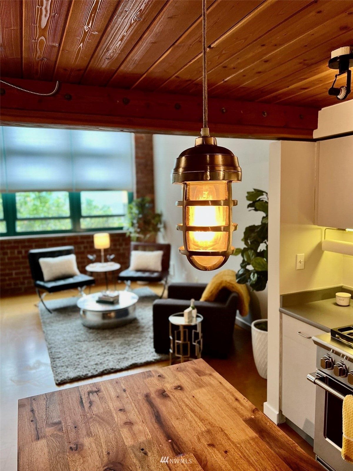 66 Bell Street, Unit 203 Seattle, WA 98121 - Photo 8 of 35 a gym room with lots of appliances and furniture