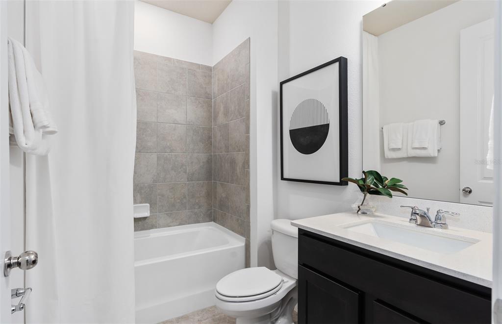 1851 Groveline Road St. Cloud, FL 34771 - Photo 17 of 19 Model Home Design Only. Pictures and furnishings are for illustrative purposes only. Elevations, colors and options may vary. Furniture is for model home staging only.