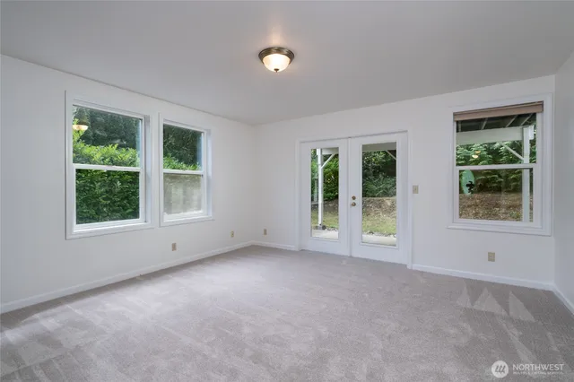 an empty room with windows