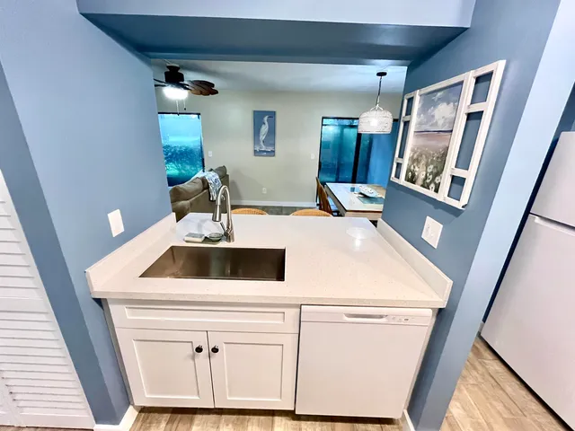 a view of a kitchen from a dining room