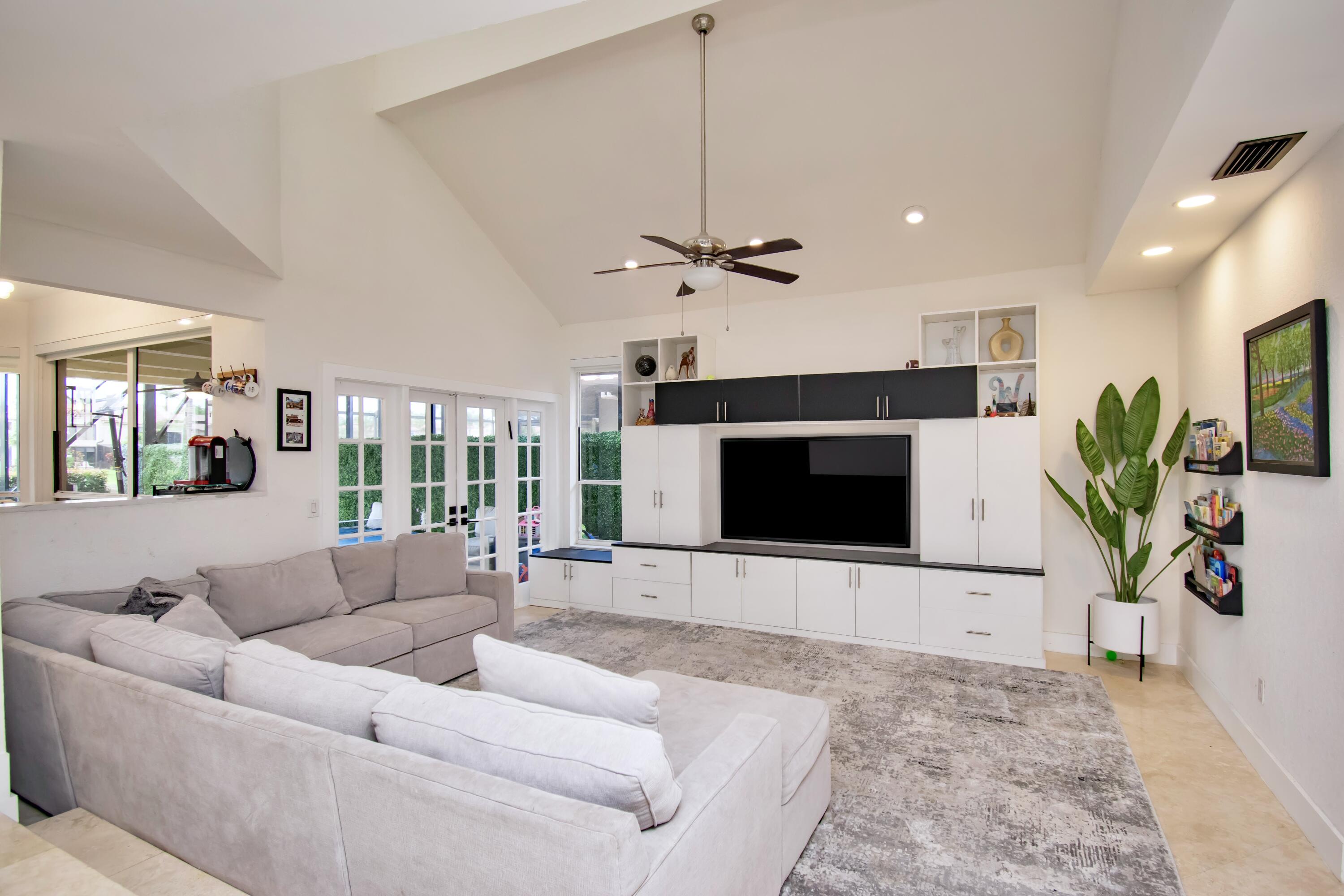 22568 Esplanada Circle Boca Raton, FL 33433 - Photo 11 of 50 a living room with furniture and a fireplace