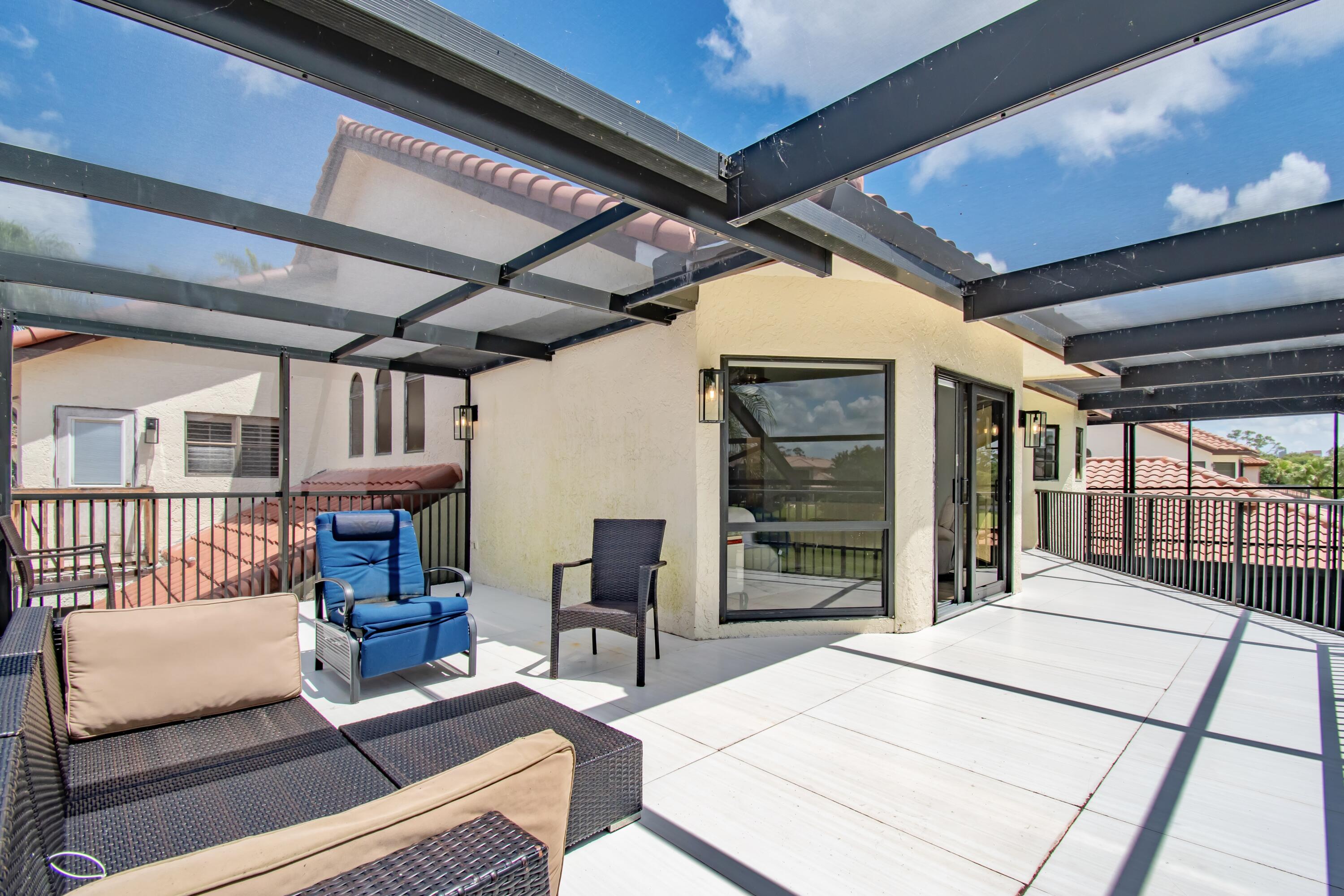 22568 Esplanada Circle Boca Raton, FL 33433 - Photo 22 of 50 a view of a porch with furniture