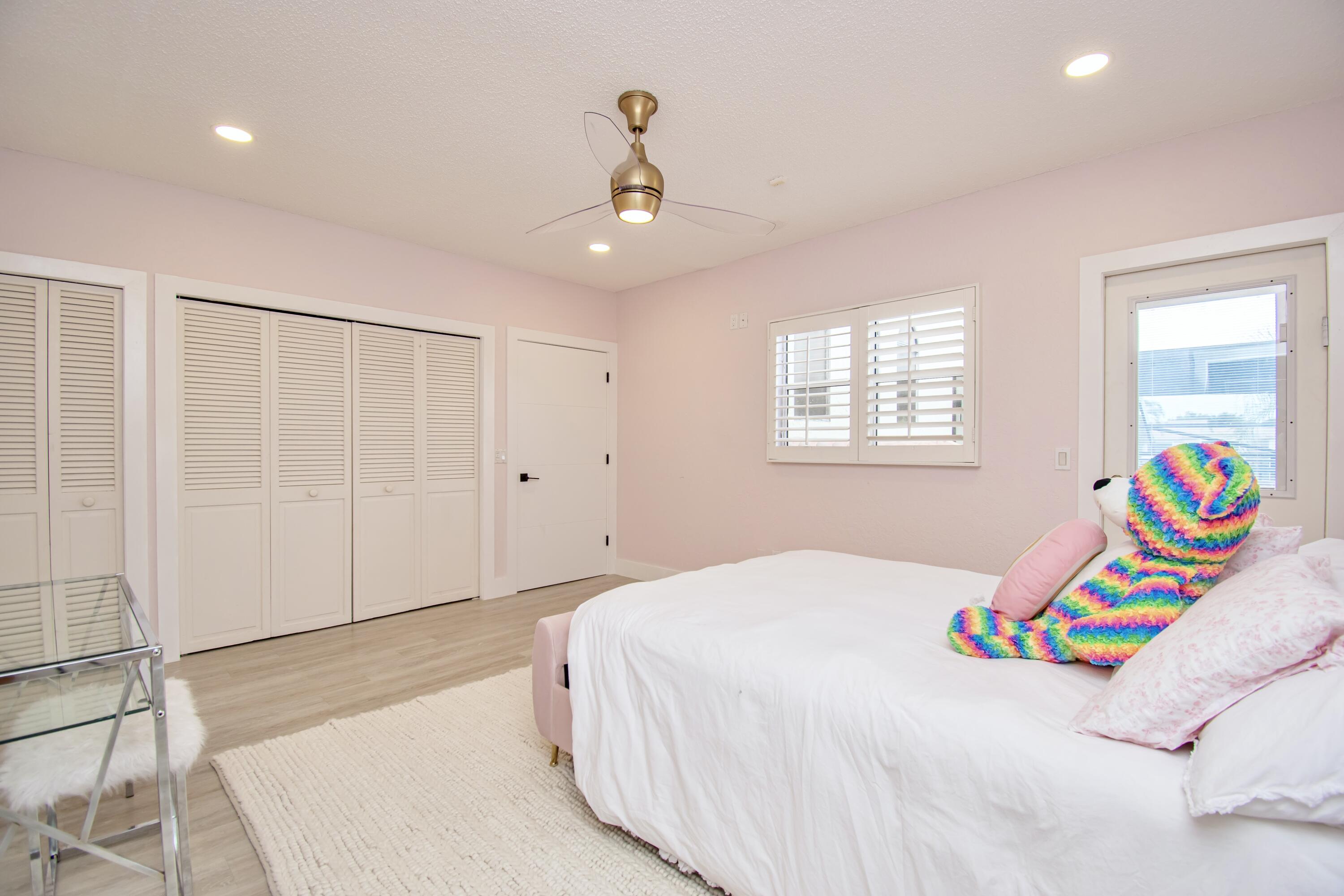 22568 Esplanada Circle Boca Raton, FL 33433 - Photo 29 of 50 a bedroom with a bed and a window
