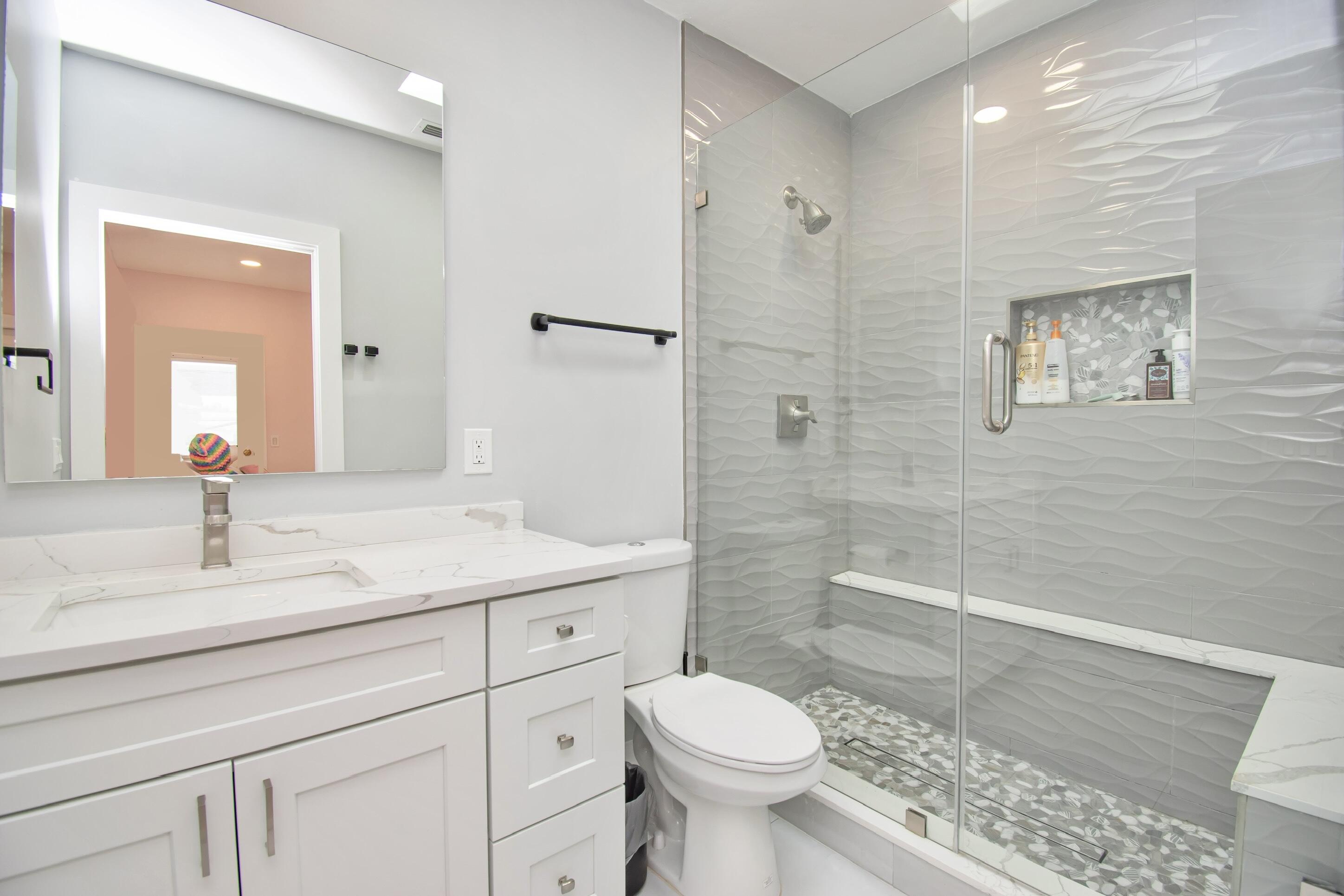 22568 Esplanada Circle Boca Raton, FL 33433 - Photo 30 of 50 a bathroom with a sink a toilet and shower