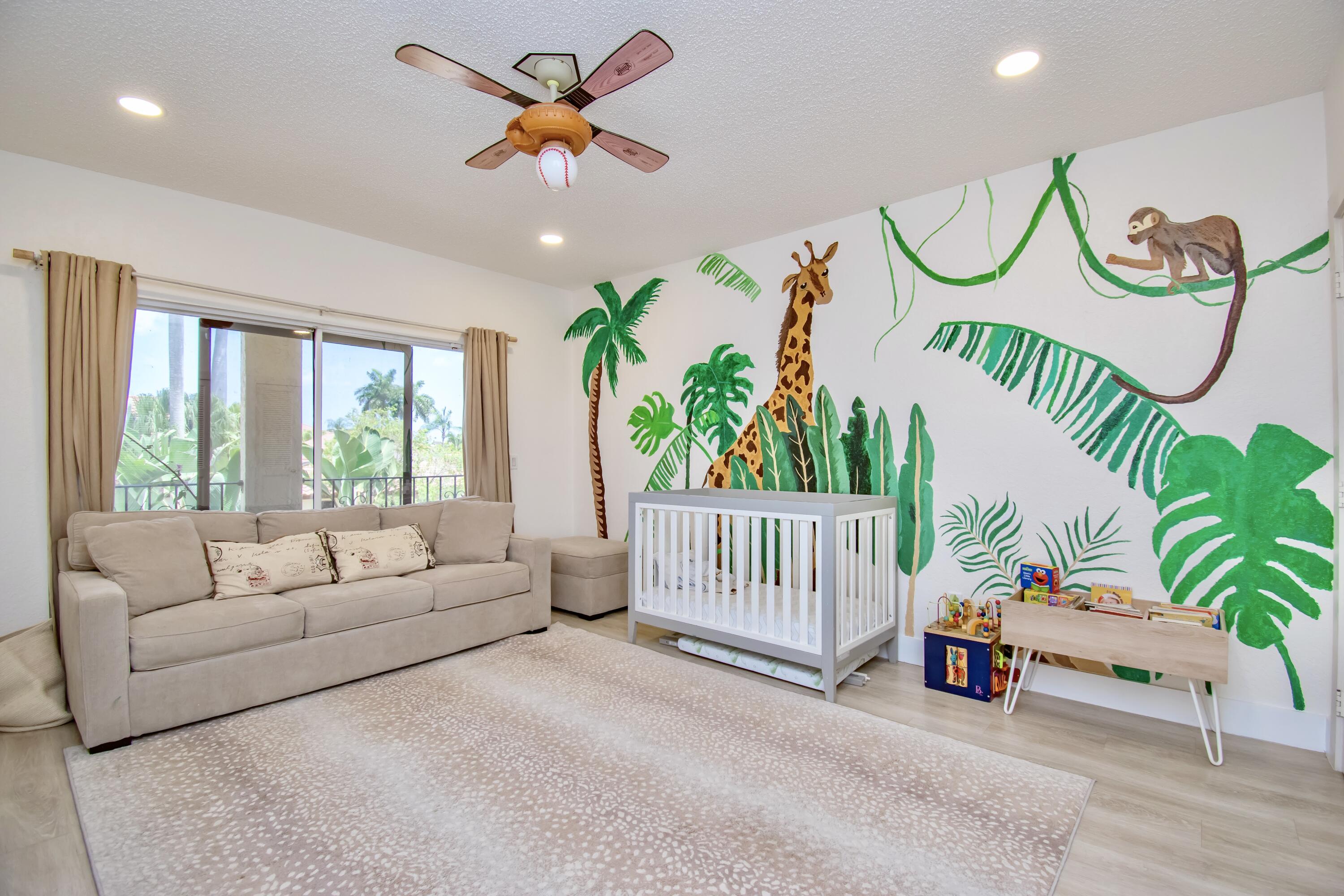 22568 Esplanada Circle Boca Raton, FL 33433 - Photo 33 of 50 a living room with furniture and a large window