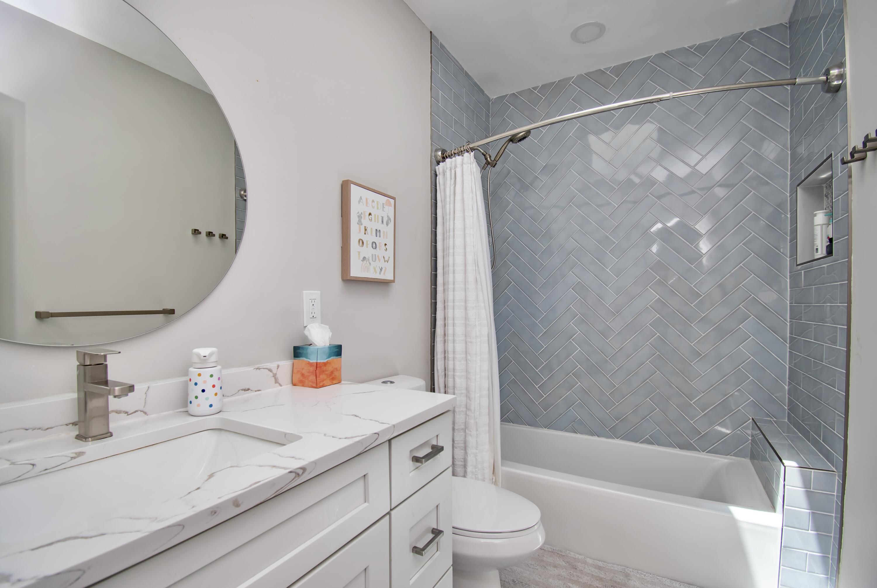 22568 Esplanada Circle Boca Raton, FL 33433 - Photo 34 of 50 a bathroom with a granite countertop shower sink vanity mirror and toilet