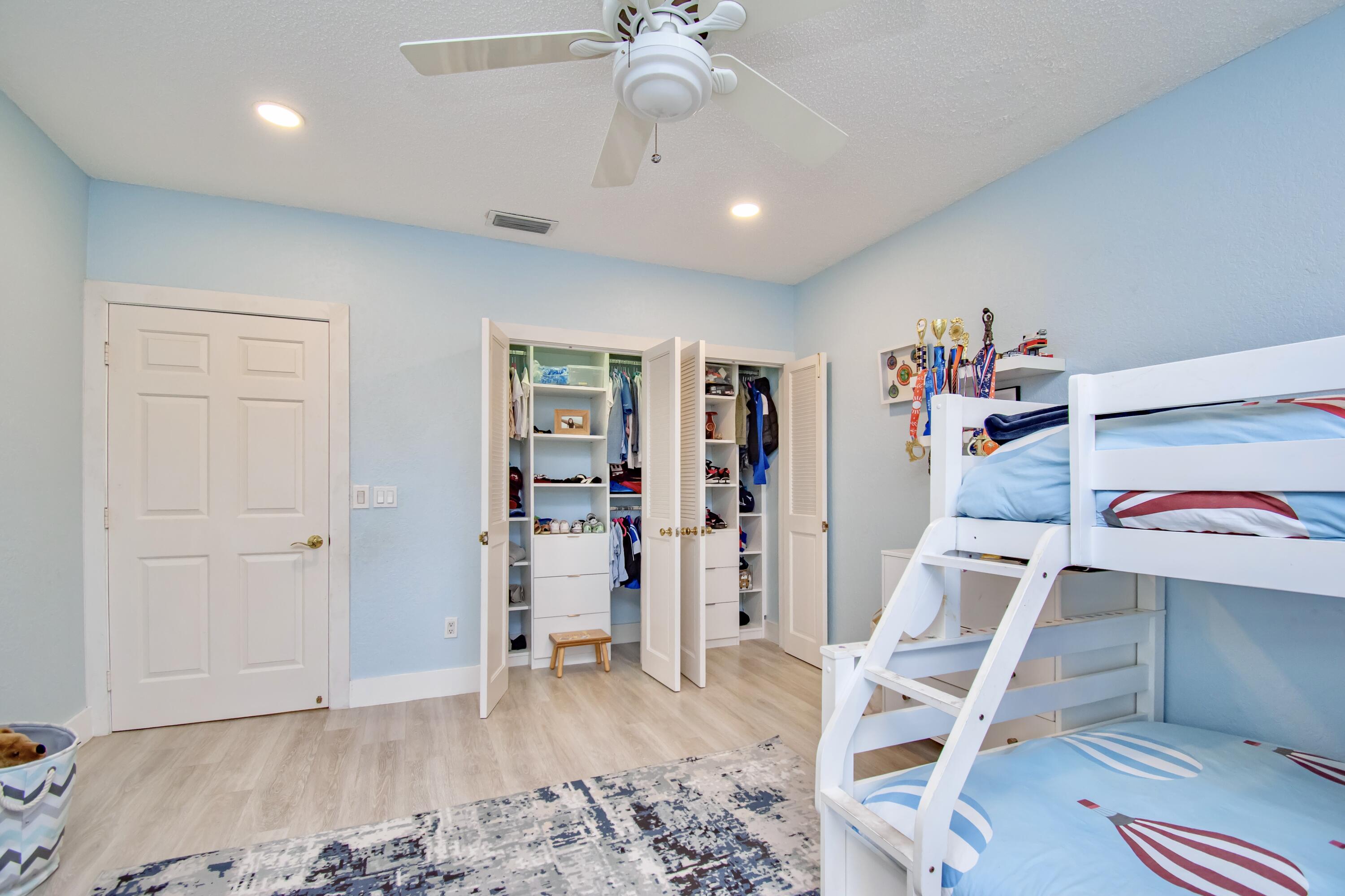 22568 Esplanada Circle Boca Raton, FL 33433 - Photo 36 of 50 a view of a workspace with furniture and wooden floor