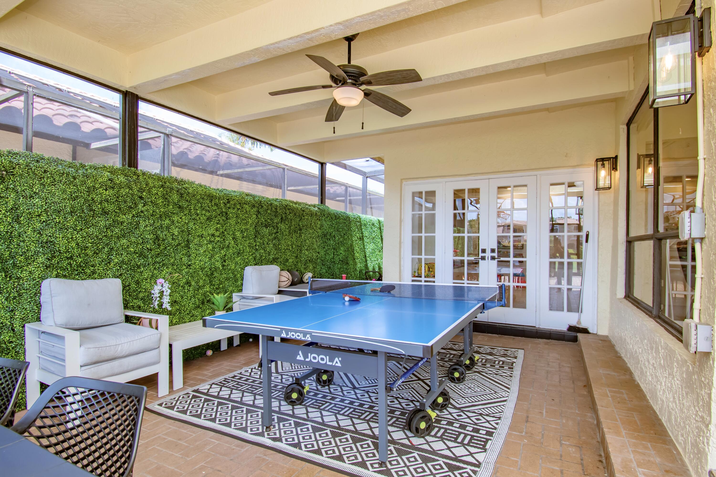 22568 Esplanada Circle Boca Raton, FL 33433 - Photo 38 of 50 a living room with furniture and a table
