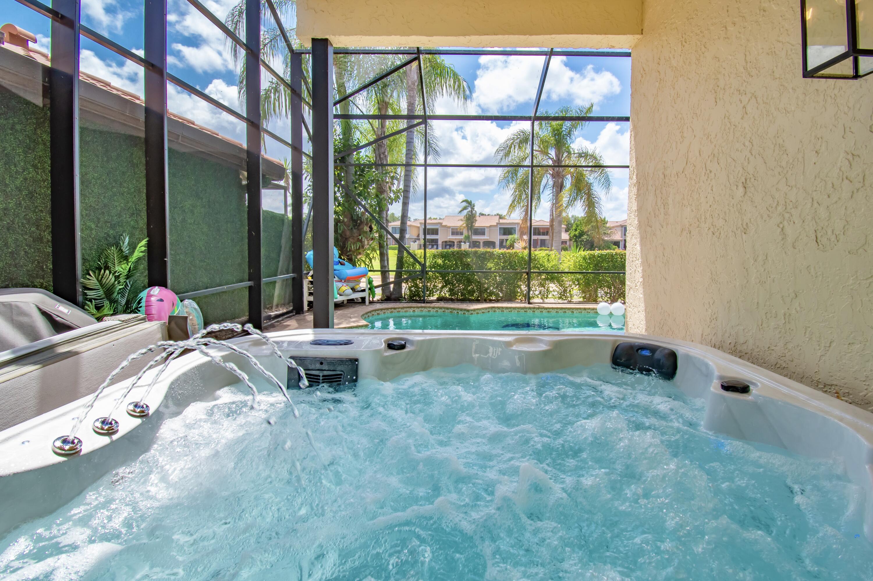 22568 Esplanada Circle Boca Raton, FL 33433 - Photo 39 of 50 a bed sitting in a bedroom next to a window