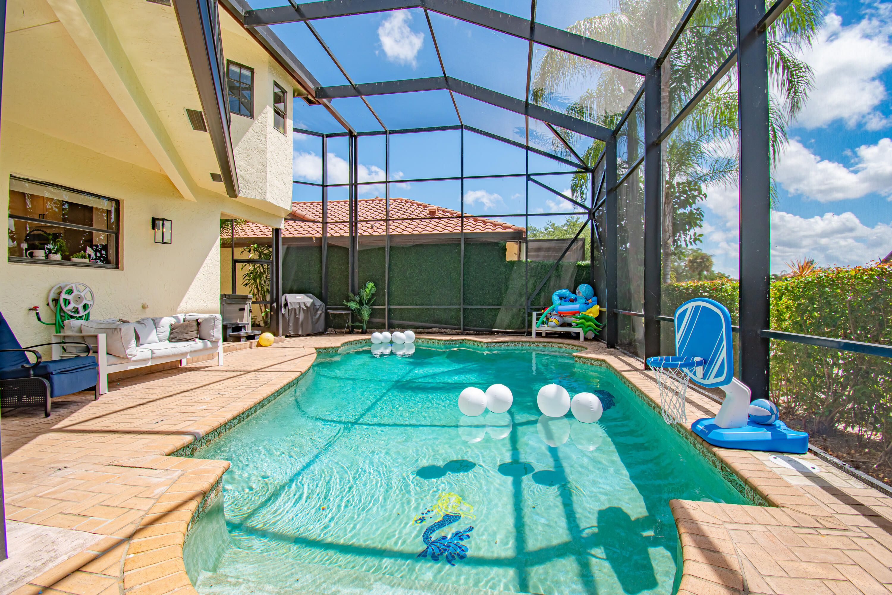 22568 Esplanada Circle Boca Raton, FL 33433 - Photo 40 of 50 a swimming pool with outdoor seating