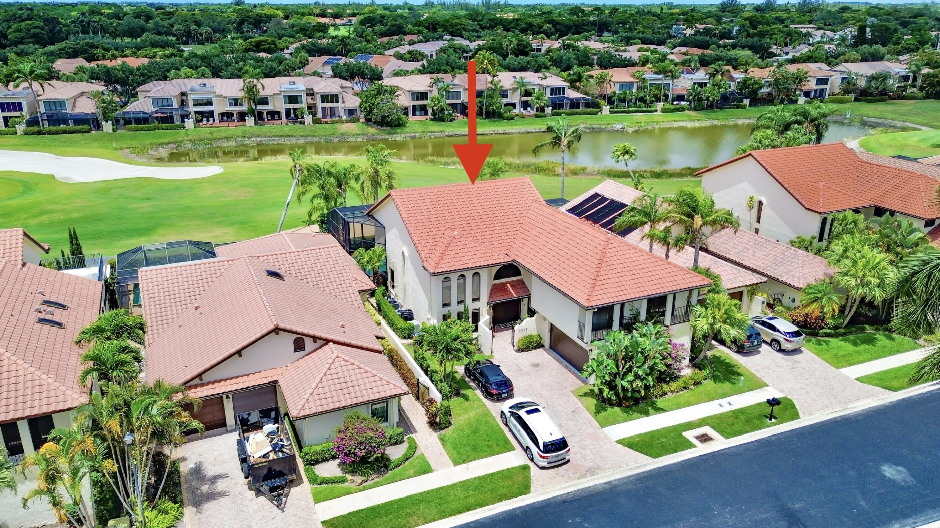 22568 Esplanada Circle Boca Raton, FL 33433 - Photo 46 of 50 an aerial view of a houses with a garden and lake view