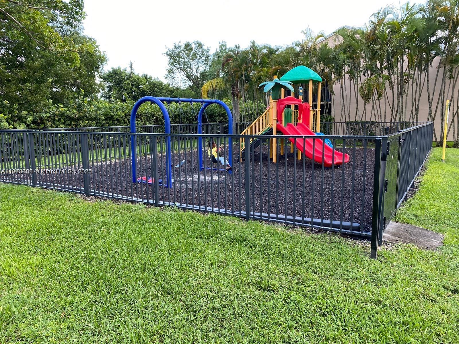 1017 Washington Circle, Unit F Homestead, FL 33034 - Photo 34 of 34 a view of park with entertaining space and a park