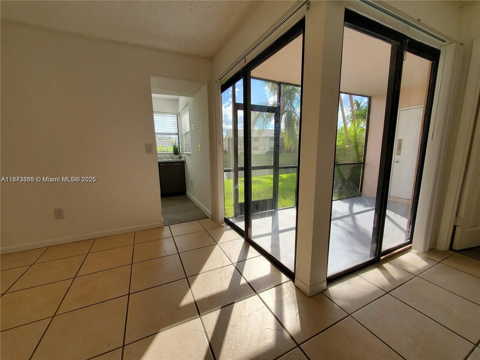 1017 Washington Circle, Unit F Homestead, FL 33034 - Photo 8 of 34 a view of a hallway