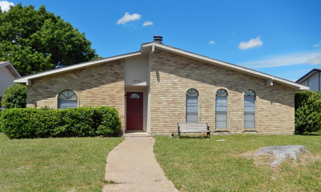 2905 Cotton Gum Road Garland, TX 75044 - Photo 1 of 1 front view of a house with a yard