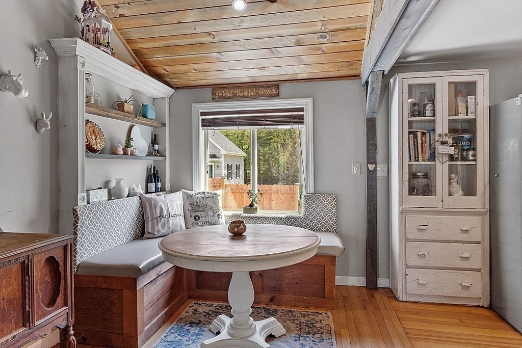 131 Lawrence Road Haverhill, MA 01835 - Photo 14 of 39 a living room with furniture and wooden floor