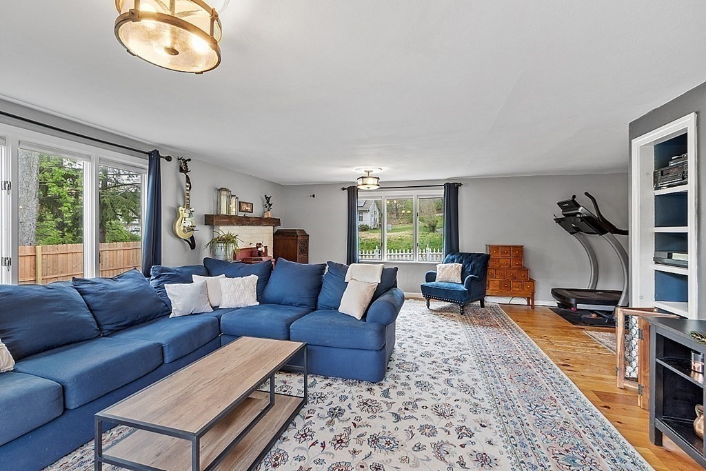 131 Lawrence Road Haverhill, MA 01835 - Photo 22 of 39 a living room with furniture a rug and a large window